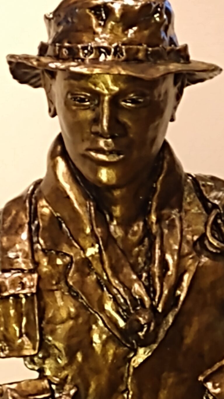 Bronze-like sculpture bust of Viet Nam era Long Range Reconnaissance Patrol Soldier.